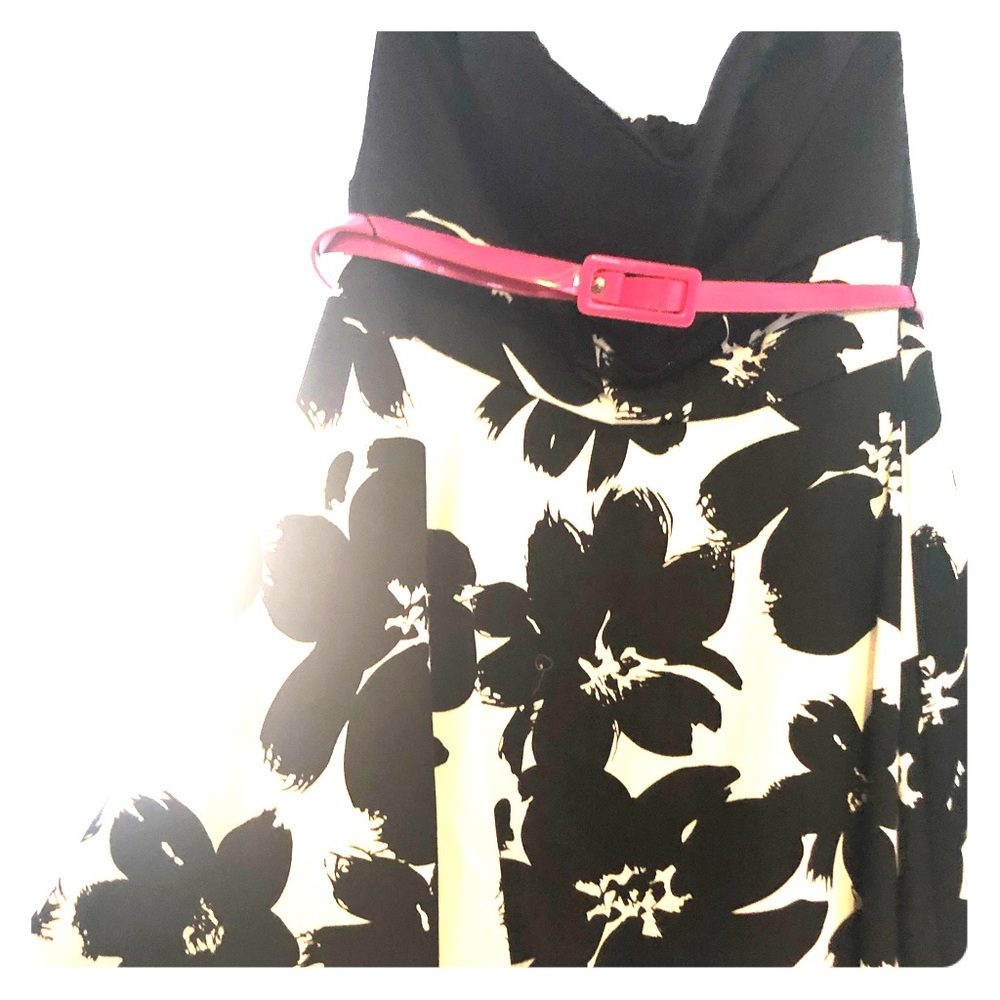 Black white dress with hot pink belt.